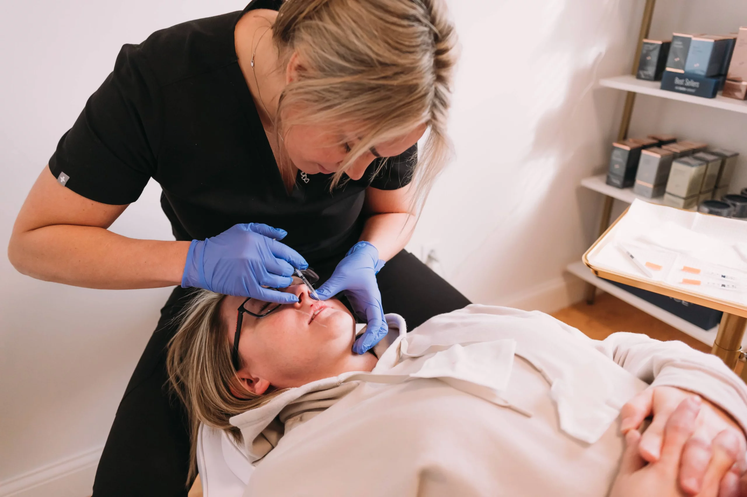 Women getting an injectable treatment in North Olmsted, OH |unveiled boutique aesthetics